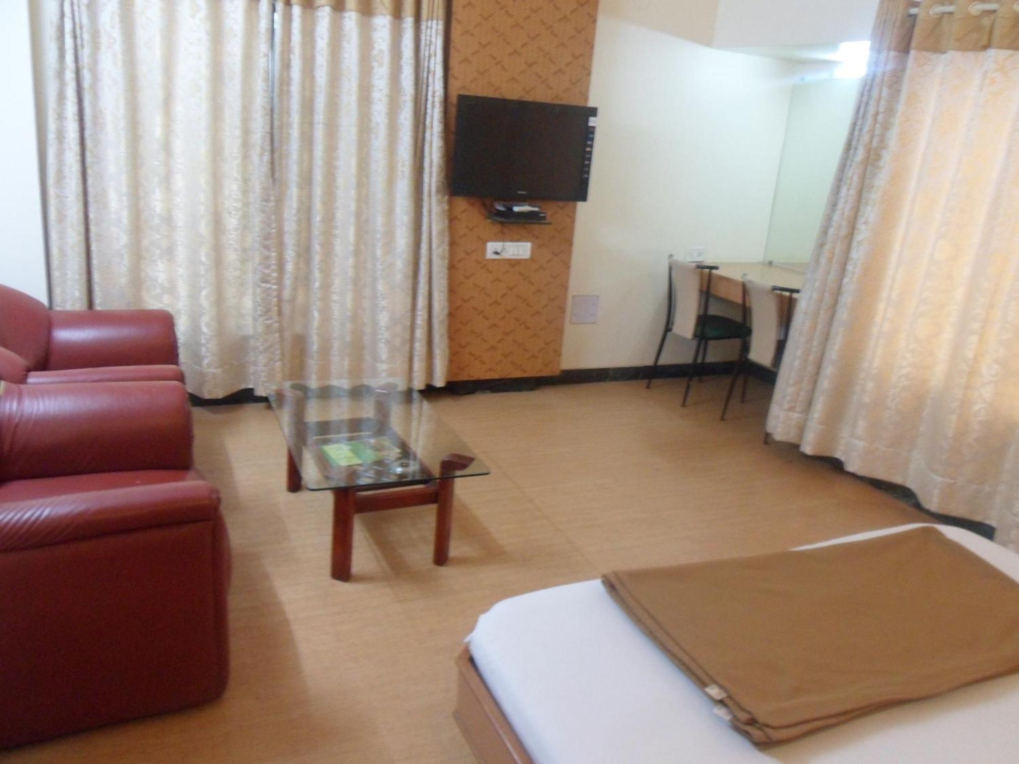 Hotel Pooja International ナーシク 部屋 写真